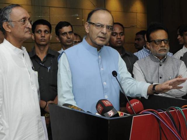 Finance Minister Arun Jaitley seen with WB finance minister Amit Mitra (L) addressing the media after the meeting of the state finance ministers in Kolkata on June 14, 2016. (Hindustan Times) Finance Minister Arun Jaitley seen with WB finance minister Amit Mitra (L) addressing the media after the meeting of the state finance ministers in Kolkata on June 14, 2016. (Hindustan Times)