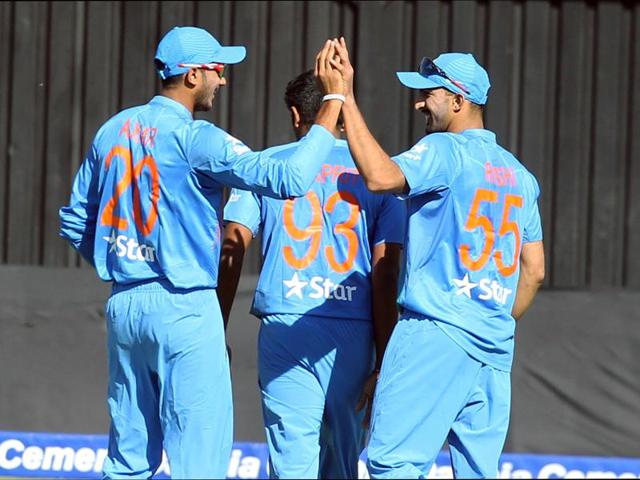 Indian players celebrate the wicket of Zimbabwe's captain Graeme Cremer. (AP) Indian players celebrate the wicket of Zimbabwe's captain Graeme Cremer. (AP)