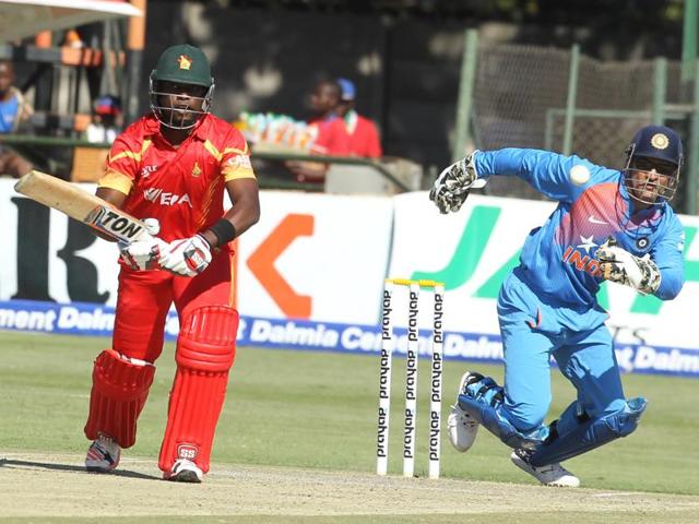 Dhoni runs to collect a shot hit by Elton Chigumbura. (AP) Dhoni runs to collect a shot hit by Elton Chigumbura. (AP)