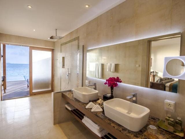 Villa bathrooms come with rain showers, double sinks, bathrobes and accessories at the Hurawalhi Island Resort, Maldives. (AFP) Villa bathrooms come with rain showers, double sinks, bathrobes and accessories at the Hurawalhi Island Resort, Maldives. (AFP)