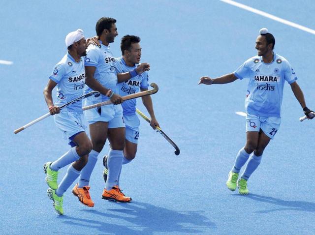 Raghunath Vokkaliga (second left) celebrates scoring their first goal during the match between Germany and India on day one of the FIH Men's Champions Trophy field hockey match at the Queen Elizabeth Olympic Park, London. (AP File Photo) Raghunath Vokkaliga (second left) celebrates scoring their first goal during the match between Germany and India on day one of the FIH Men's Champions Trophy field hockey match at the Queen Elizabeth Olympic Park, London. (AP File Photo)