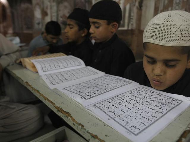 Students attend a madrassa in Peshawar. Religious schools in Pakistan, most of them in mosques are the only source of education for a number of children. (Representative image) Students attend a madrassa in Peshawar. Religious schools in Pakistan, most of them in mosques are the only source of education for a number of children. (Representative image)