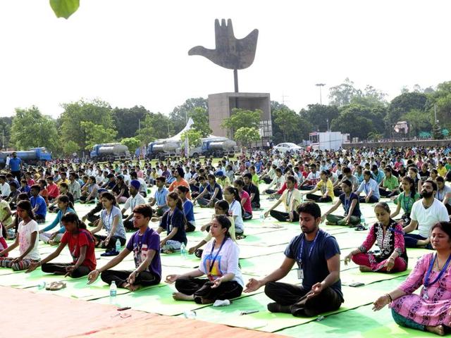 Participants during the full dress rehearsal ahead of the International Yoga Day at Capitol Complex on Sunday.(Keshav Singh/HT)