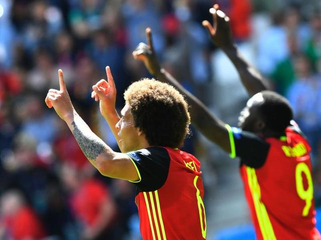 Axel Witsel and Romelu Lukaku (R) celebrate at the end of the match, which Belgium won 3-0. (AFP)
