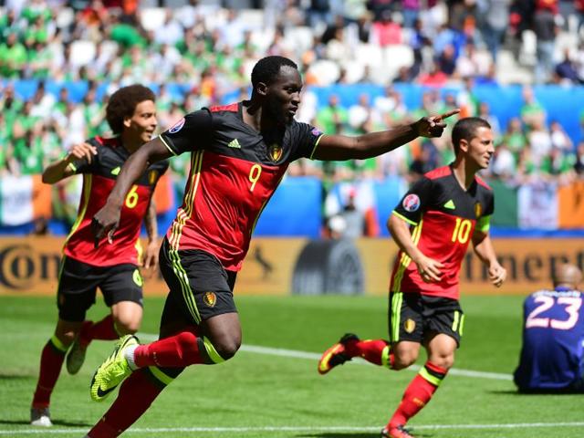 Romelu Lukaku (C) is joined by Witsel, left, and Eden Hazard to celebrate his goal. (AFP)
