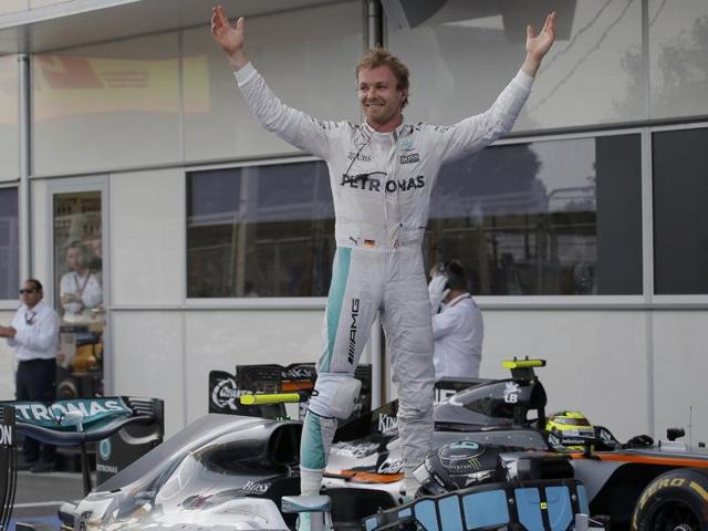 Mercedes Formula One driver Nico Rosberg of Germany celebrates winning the race. (Reuters Photo) Mercedes Formula One driver Nico Rosberg of Germany celebrates winning the race. (Reuters Photo)