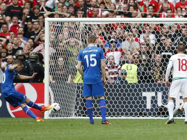 Iceland's Gylfi Sigurdsson scores their first goal from the penalty spot. (REUTERS)