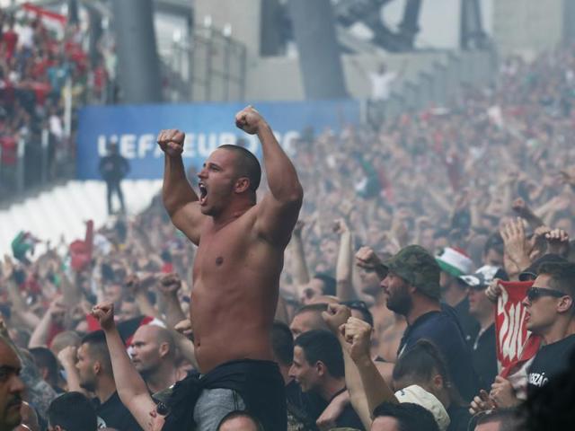 Hungary fans celebrate after the game. (REUTERS)