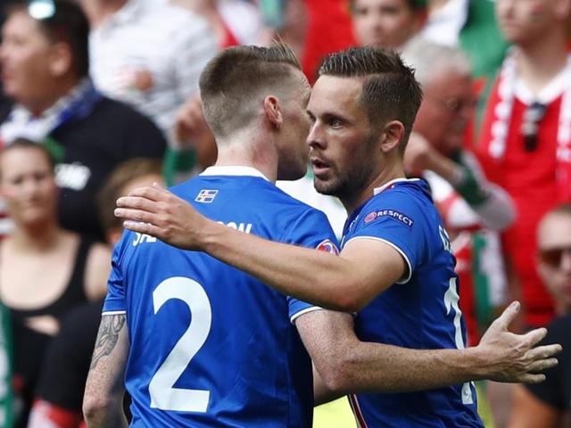 Iceland's Gylfi Sigurdsson, right, celebrates after scoring their first goal. (REUTERS)
