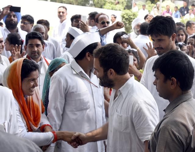 Congress vice-president Rahul Gandhi greeted by party workers at all India congress committee office in New Delhi on Sunday. (Sonu Mehta/ Hindustan Times)