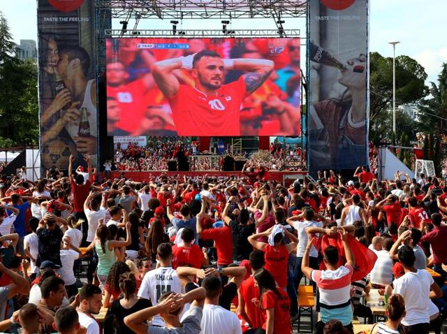 Albanian fans watch a live broadcast, showing Albania versus Switzerland in the European Championship in front of a big screen at Mother Teresa Square in the capital, Tirana. (AP Photo) Albanian fans watch a live broadcast, showing Albania versus Switzerland in the European Championship in front of a big screen at Mother Teresa Square in the capital, Tirana. (AP Photo)