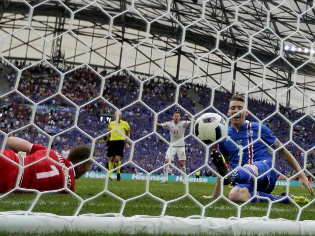 Iceland's Birkir Saevarsson scores the own goal. (AP)