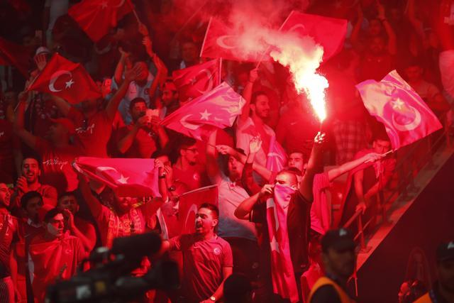 Turkey fans light a flare during the Euro 2016. (Reuters Photo) Turkey fans light a flare during the Euro 2016. (Reuters Photo)