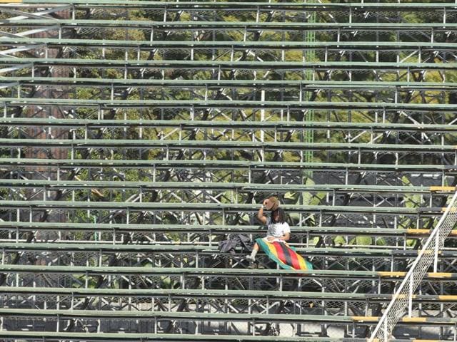 A lone Zimbabwean supporter sits in the stands during the One Day International cricket match against India at Harare Sports Club. The Indian cricket team is in Zimbabwe for One Day International and T20 matches. (AP) A lone Zimbabwean supporter sits in the stands during the One Day International cricket match against India at Harare Sports Club. The Indian cricket team is in Zimbabwe for One Day International and T20 matches. (AP)