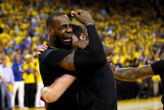 LeBron James #23 and Kevin Love #0 of the Cleveland Cavaliers celebrate after defeating the Golden State Warriors 93-89 in Game 7 of the 2016 NBA Finals. (AFP) LeBron James #23 and Kevin Love #0 of the Cleveland Cavaliers celebrate after defeating the Golden State Warriors 93-89 in Game 7 of the 2016 NBA Finals. (AFP)