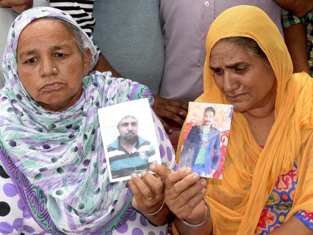 Kin of the youths, who were allegedly abducted by the Islamic State militia two years ago in Iraq, at a press conference in Amritsar on Sunday. (HT Photo)