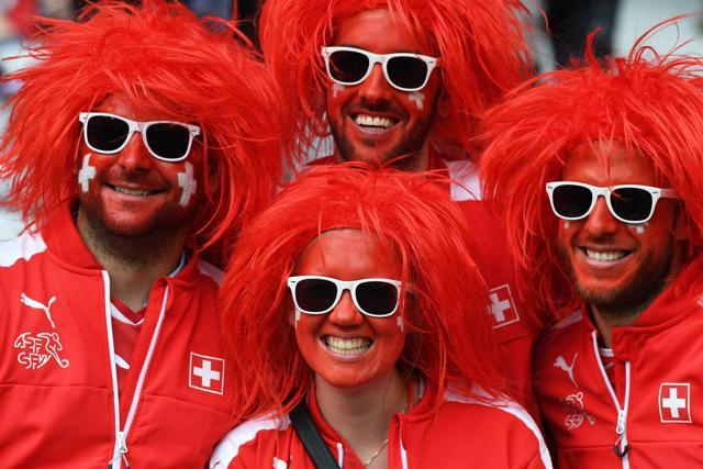 Switzerland supporters happy with their team, who made it to the knockout phase of the Euros for the first time. (AP) Switzerland supporters happy with their team, who made it to the knockout phase of the Euros for the first time. (AP)