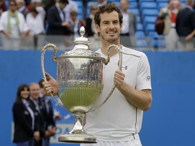 Murray beat Milos Raonic to lift a record fifth trophy at Queen’s Club. (AP) Murray beat Milos Raonic to lift a record fifth trophy at Queen’s Club. (AP)
