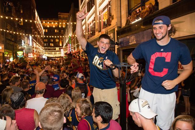 Fans react in downtown Cleveland after the Cleveland Cavaliers won the NBA Finals. (AFP) Fans react in downtown Cleveland after the Cleveland Cavaliers won the NBA Finals. (AFP)
