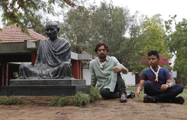 Irfan Khan and his son Ayan, pose for photographs next to a statue of Mahatma Gandhi during their visit to Gandhi Ashram or Sabarmati Ashram in Ahmadabad on Sunday, June 19, 2016. (AP) Irfan Khan and his son Ayan, pose for photographs next to a statue of Mahatma Gandhi during their visit to Gandhi Ashram or Sabarmati Ashram in Ahmadabad on Sunday, June 19, 2016. (AP)