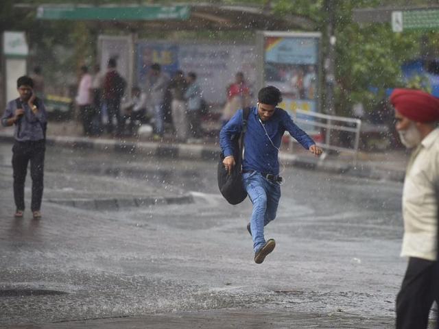 But, for a little while, the rain infused fresh life into a city wilting under the scorching heat. (Ravi Choudhary/ HT Photo) But, for a little while, the rain infused fresh life into a city wilting under the scorching heat. (Ravi Choudhary/ HT Photo)