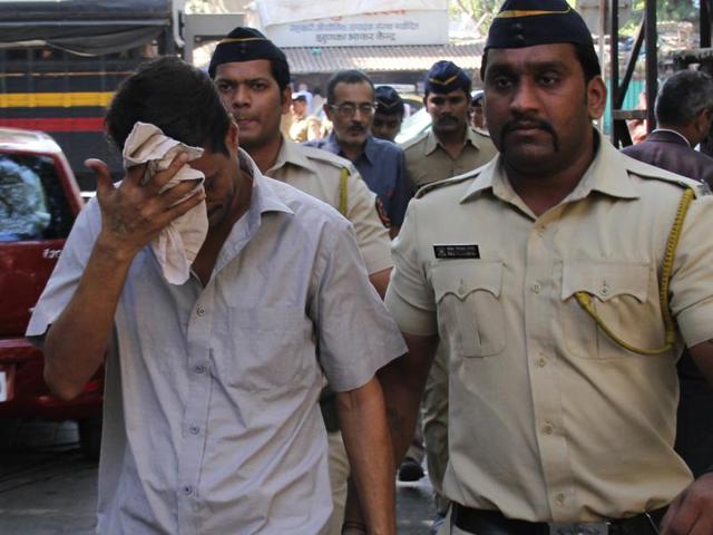 Shyamvar Rai, the former driver of Indrani Mukerjea, is being escorted to the Esplanade court in Mumbai. (HT File Photo) Shyamvar Rai, the former driver of Indrani Mukerjea, is being escorted to the Esplanade court in Mumbai. (HT File Photo)