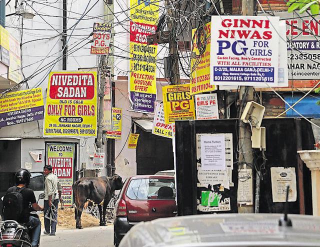 With admission process in full swing at Delhi University, banners of PG and flats have mushroomed all around North and South Campus. (AMAL KS/HINDUSTAN TIMES) With admission process in full swing at Delhi University, banners of PG and flats have mushroomed all around North and South Campus. (AMAL KS/HINDUSTAN TIMES)