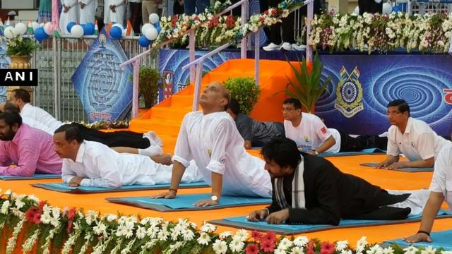 Union home minister Rajnath Singh performs yoga in Lucknow. (ANI Photo) Union home minister Rajnath Singh performs yoga in Lucknow. (ANI Photo)