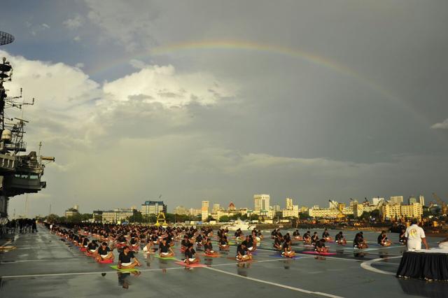 Yoga on board the India INS Viraat, in spite of monsoon rains in Mumbai. (@indiannavy Twitter handle) Yoga on board the India INS Viraat, in spite of monsoon rains in Mumbai. (@indiannavy Twitter handle)