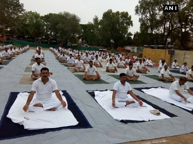 CRPF personnel at yoga camp in Gaya, Bihar. (ANI Photo) CRPF personnel at yoga camp in Gaya, Bihar. (ANI Photo)