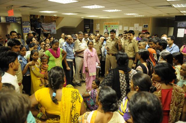Family members of the 23-year-old woman staged a protest at the hospital and said they will accept the newborn girl only if they are given the other child as well. City Magistrate Bachchu Singh and police officers visited the hospital on Tuesday and assured the family of a probe to ascertain the truth. (Burhaan Kinu /HT) Family members of the 23-year-old woman staged a protest at the hospital and said they will accept the newborn girl only if they are given the other child as well. City Magistrate Bachchu Singh and police officers visited the hospital on Tuesday and assured the family of a probe to ascertain the truth. (Burhaan Kinu /HT)