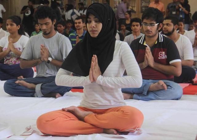 Mumbai, India - 21 June 2016:Students of RD National College, Bandra, perform yoga . (pramod thakur)