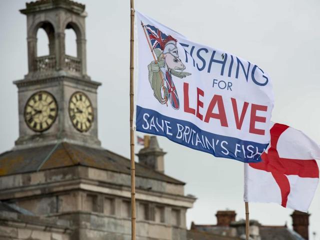 A pro-Brexit flag flies from a fishing boat moored in Ramsgate on June 13, 2016.(AFP)