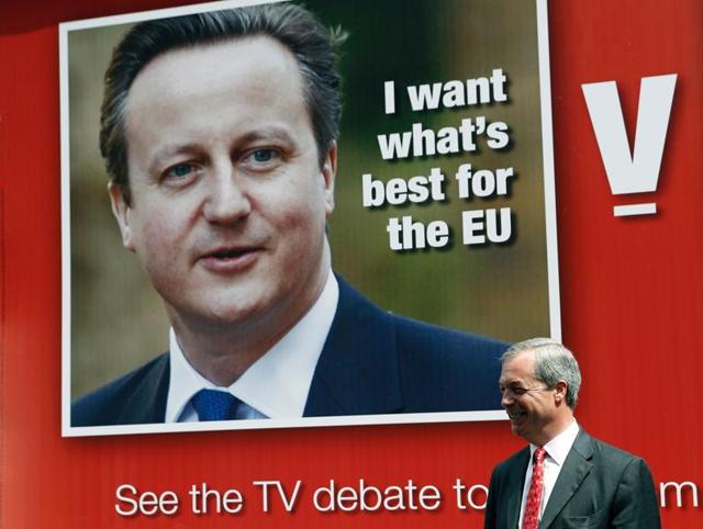 UK Independence Party Leader (UKIP) Nigel Farage addresses the media during the launch of a poster depicting Britain's Prime Minister David Cameron (L) ahead of a television debate on the EU referendum in London on June 7, 2016.(AFP)