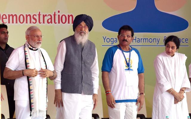 (From Left) Prime Minister Narendra Modi, Punjab chief minister Parkash Singh Badal, Union Ayush minister Shripad Yasso Naik and Chandigarh MP Kirron Kher during the International Yoga Day event at Capitol Complex in Chandigarh on Tuesday. (Sanjeev Sharma/HT Photo)