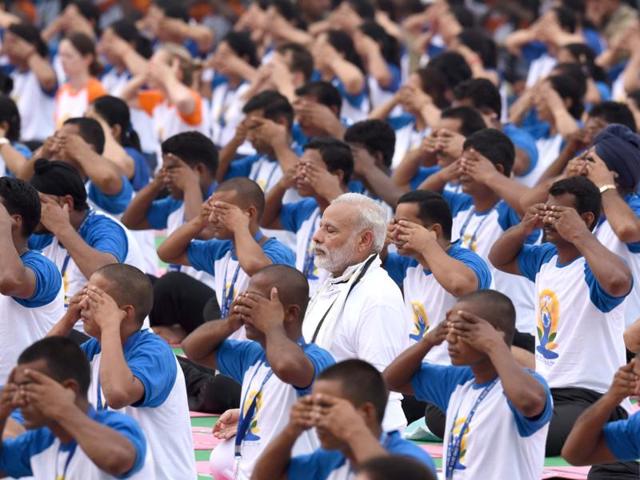 PM Narendra Modi performing yoga at the second International Day of Yoga, at Capitol Complex, Chandigarh, on Tuesday. (Sanjeev Sharma/HT Photo) 