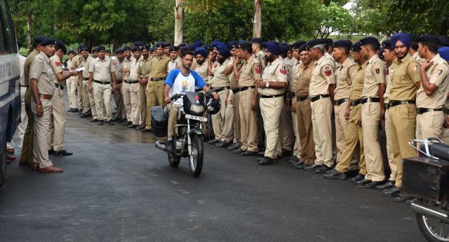 Police during preparation of International Yoga Day at the Capitol Complex on Monday evening. (Sanjeev Sharma/HT Photo)