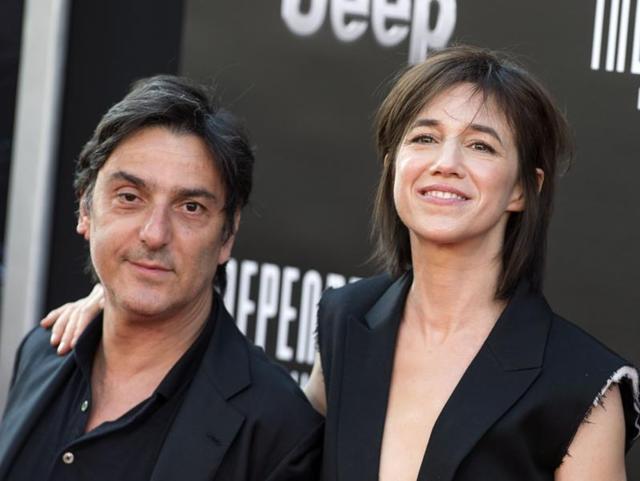 Director Yvan Attal (L) and actress Charlotte Gainsbourg attend the premiere of Independence Day: Resurgence. (AFP)