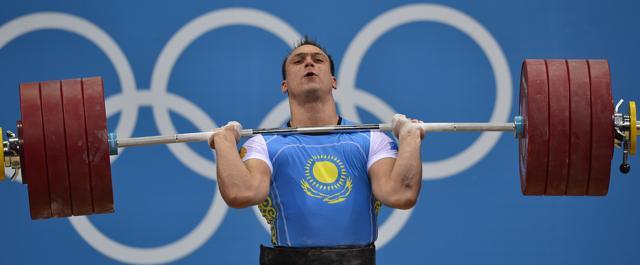 Ilya Ilyin competes during the men's 94kg group A weightlifting event of the London 2012 Olympic Games at The Excel Centre in London. (AFP File Photo)