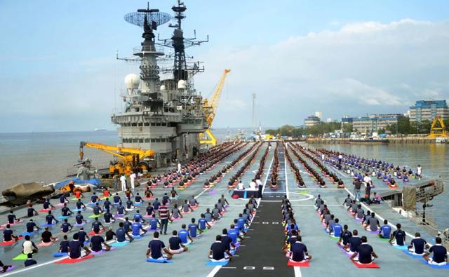 Mumbai:-A mass yoga demonstration in progress on the deck of INS Viraat . (Sandeep Mahankal)