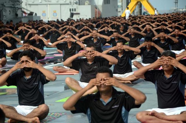 Mumbai:-Indian Naval Cadets practice yoga on INS Viraat. (Sandeep Mahankal)