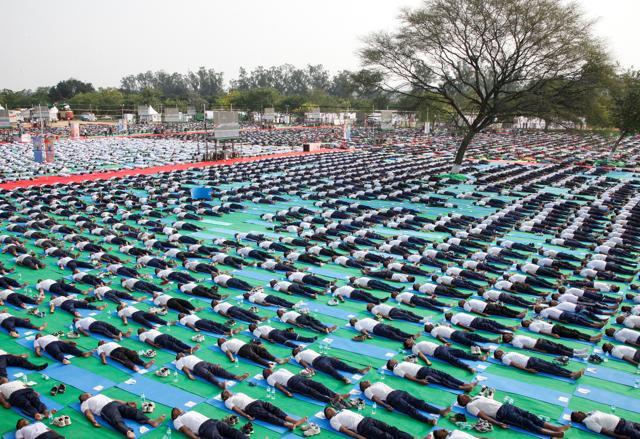 Participants perform yoga during full dress rehearsal ahead of World Yoga Day in Chandigarh. (REUTERS)