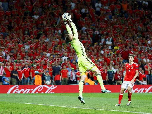Wales' goalkeeper Wayne Hennessey makes a save during their Group B match against Russia. (Reuters Photo)