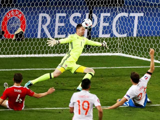 Wales' goalkeeper Wayne Hennessey makes a save during their Group B clash against Russia. (Reuters Photo)