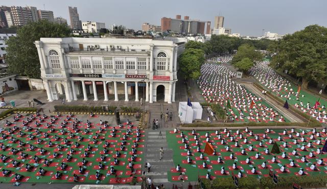 A general view of Connaught Place in Delhi where people can be seen performing yoga exercises. (Raj K Raj/HT Photo) A general view of Connaught Place in Delhi where people can be seen performing yoga exercises. (Raj K Raj/HT Photo)