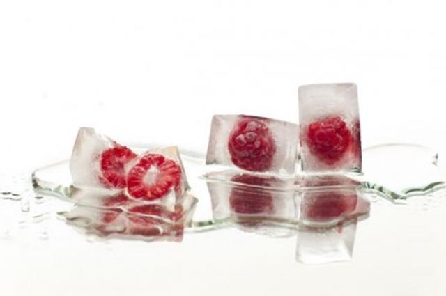 Try placing a chunk of fruit in each compartment in the ice tray. Try placing a chunk of fruit in each compartment in the ice tray.