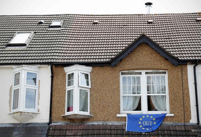 A pro-Brexit flag is attached to a window of a house in Carshalton, south of London. (AFP) A pro-Brexit flag is attached to a window of a house in Carshalton, south of London. (AFP)