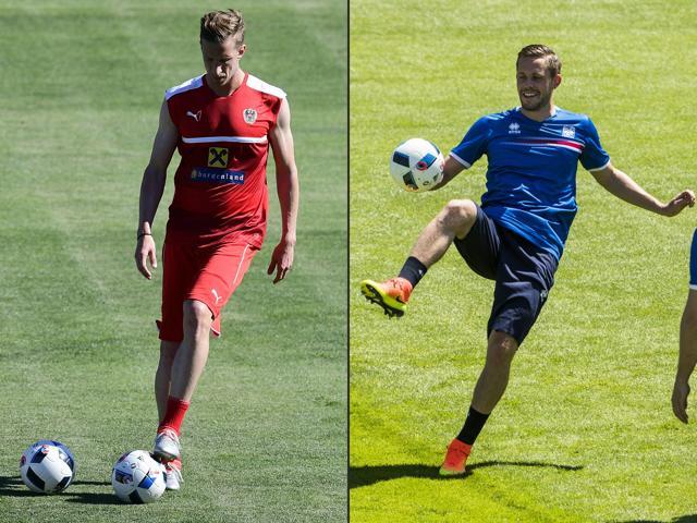 Combination picture of Austria's forward Marc Janko (left) and Iceland's midfielder Gylfi Sigurdsson. (AFP Photo)