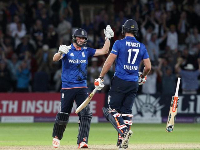 England's Liam Plunkett (right) celebrates with Chris Woakes after Plunkett hit a six off the final ball to draw the first one day international (ODI) cricket match between England and Sri Lanka at Trent Bridge cricket ground in Nottingham, England. (AFP Photo) England's Liam Plunkett (right) celebrates with Chris Woakes after Plunkett hit a six off the final ball to draw the first one day international (ODI) cricket match between England and Sri Lanka at Trent Bridge cricket ground in Nottingham, England. (AFP Photo)