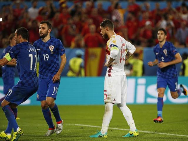 Spain's Sergio Ramos reacts after missing a penalty during a Euro 2016 group stage match against Croatia. (Reuters Photo) Spain's Sergio Ramos reacts after missing a penalty during a Euro 2016 group stage match against Croatia. (Reuters Photo)